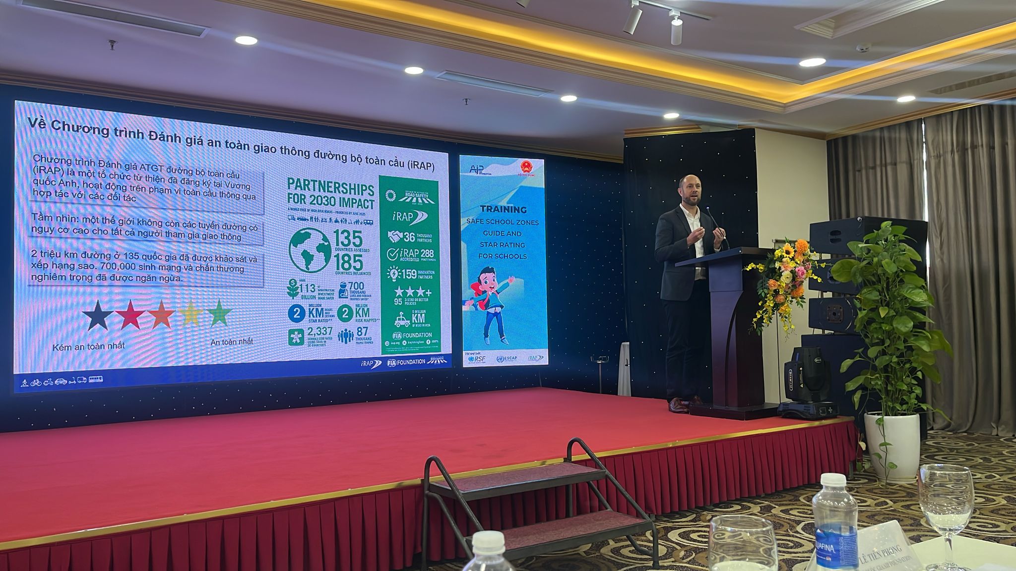 Greg deliverin speech in Vietnam